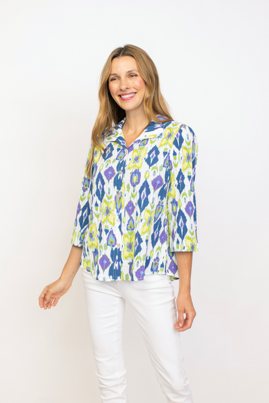 Retro Swing Shirt from Habitat. Made with lightweight cotton and 3/4 sleeves, this button down offers both comfort and fashion. Its breathable fabric and Ikat mix print make it a must-have for any wardrobe. 
