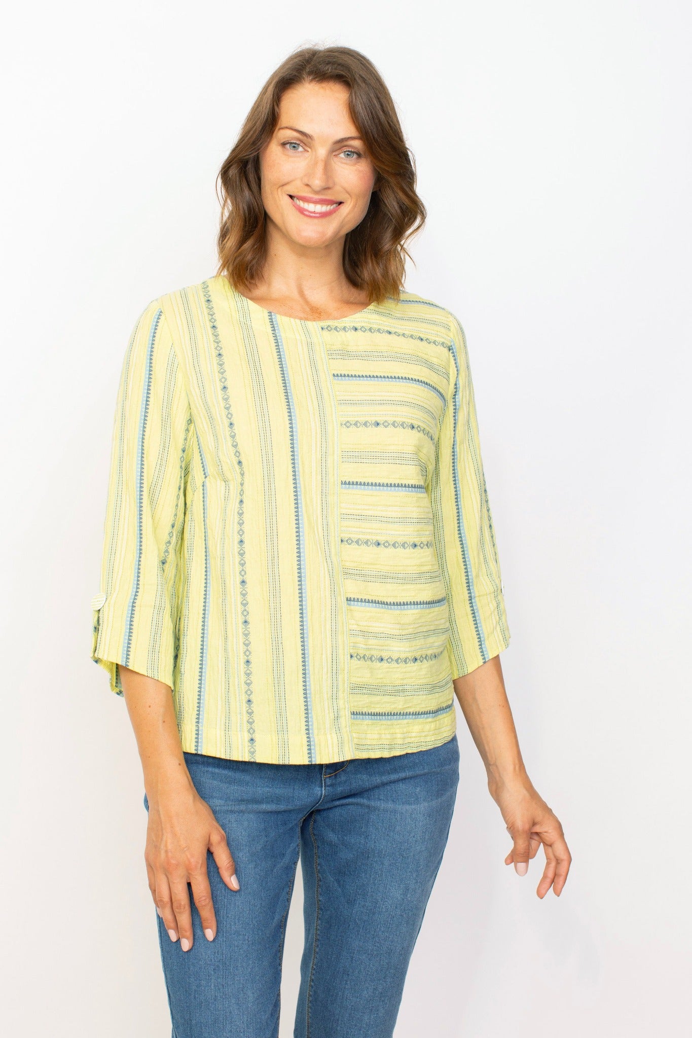 the Coastal Button Back Pullover in Aloe by Habitat. Its 3/4 slit sleeves with button detail add a touch of elegance to this versatile piece. Perfect for any occasion, this pullover offers both style and comfort.