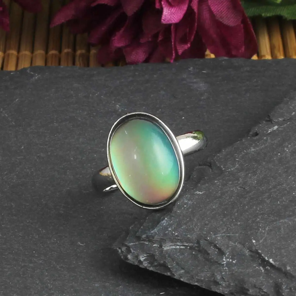 Express yourself with this adjustable Mood Ring! A retro-inspired classic with a mood chart, show off your feelings in style