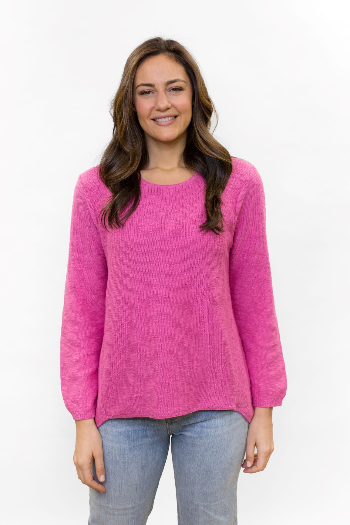 100% cotton slub sweater by Avalin. In color Fuchsia with long sleeves, crew neck, and high low hem that falls nicely to cover hips and derriere. Made in USA. 
