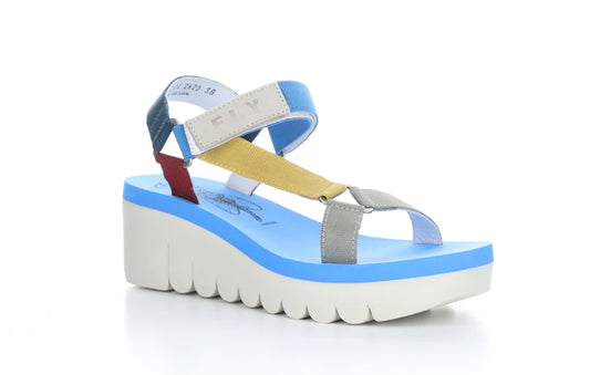 The Fly London Cupido Multicolor is crafted from  and is lined with this material, contributing to its lightweight feel, and the adjustable hook and loop strap adds convenience to the design. Its 2.5 inch wedge provides superior shock absorption, while the colorful fabric straps offer flexibility. This shoe is made in Portugal.