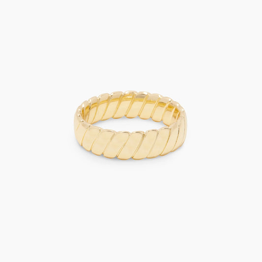 The Gorjana Laney Ring is 18K gold plated brass, giving it a bold, timeless style. Its wide band design makes it the perfect statement piece, and its stackable function gives endless styling possibilities. This stylish piece is from renowned designer Gorjana, making it a perfect addition to any wardrobe.
