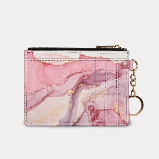 RFID Credit Card Wallet  with zipper pouch and gold tone key chain. Pink, white, and gold marble print on vegan leather. Size 5 inches by 3 1/4 inches